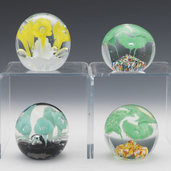 Appraisal: FOUR FLOWER PAPERWEIGHTS Including Maude and Bob St Clair paperweights