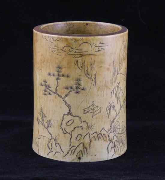 Appraisal: A Chinese ivory brush pot th th century incised and