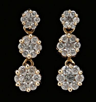 Appraisal: Pair drop diamond earrings three graduated circles each set with