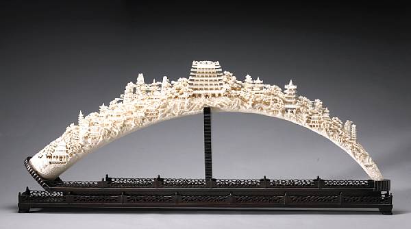 Appraisal: A massive reticulated ivory tusk Late th Century Deeply undercut