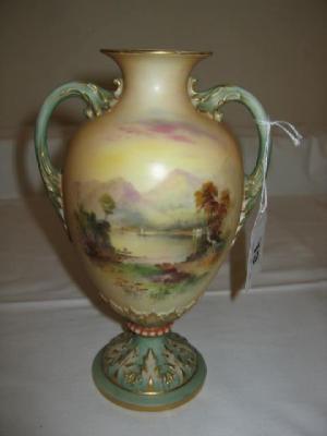 Appraisal: A ROYAL WORCESTER TWO HANDLED VASE of ovoid form in