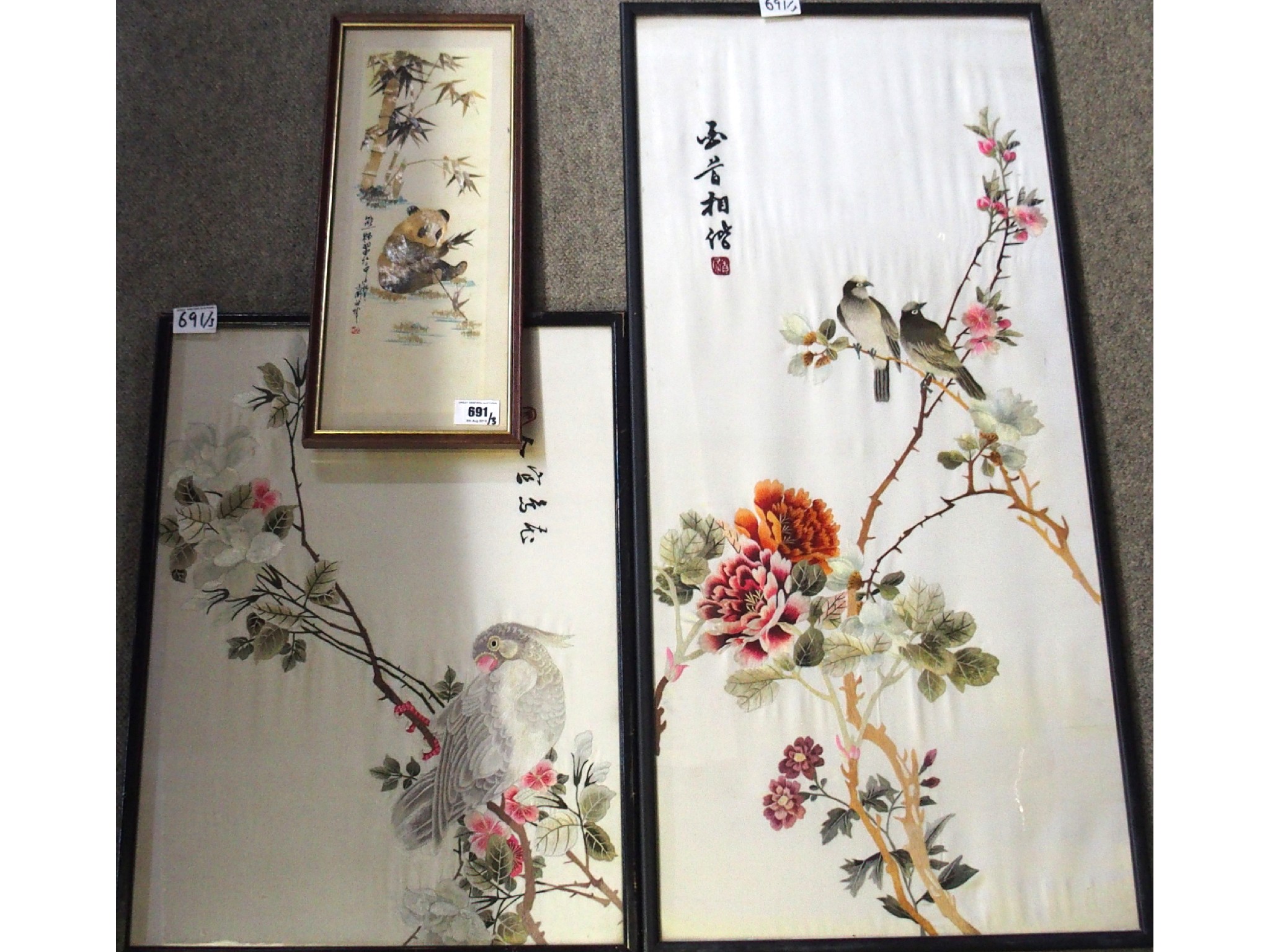 Appraisal: Three framed Japanese needlework panels