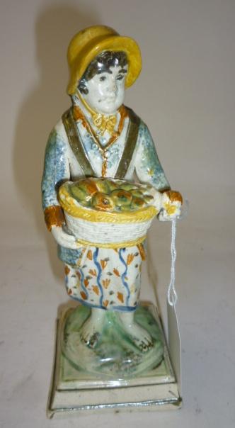 Appraisal: A PRATTWARE FIGURE late th century modelled as Summer the