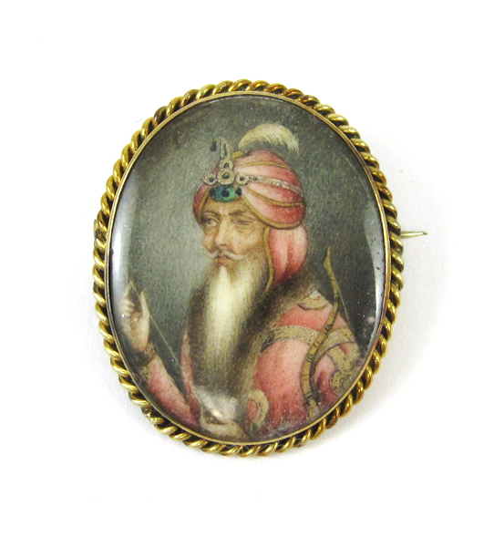 Appraisal: MINIATURE PORTRAIT BROOCH The oval portrait on bone mounted in