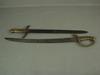 Appraisal: SWORDS - Lot of two th C cast brass handle