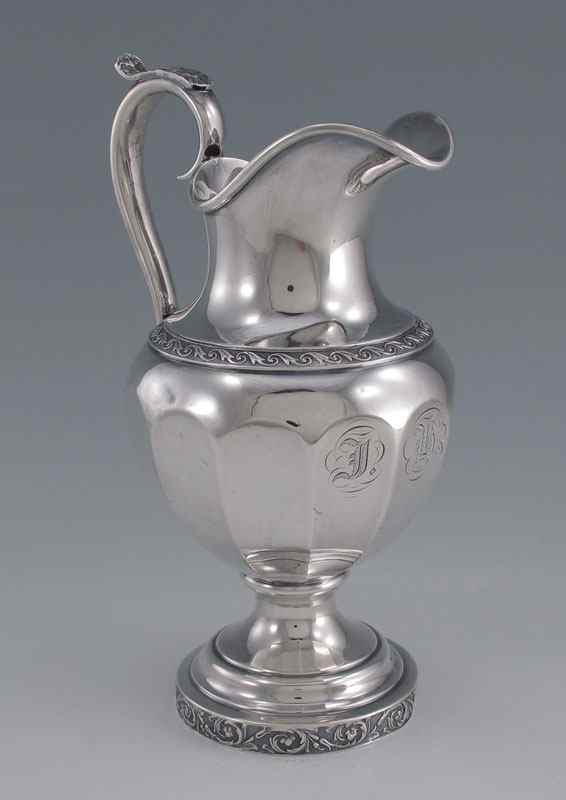 Appraisal: LINCOLN AND FOSS COIN SILVER PITCHER Embossed floral motif monogrammed