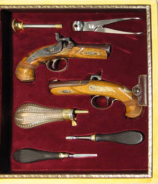 Appraisal: A cased pair of silver-mounted Henry Deringer Commemorative percussion pistols