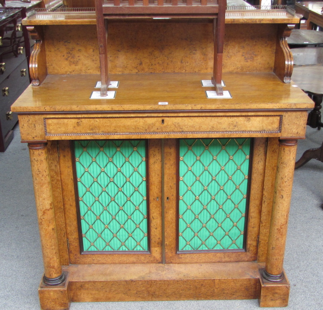 Appraisal: A George IV burr elm shelf back chiffonier with single