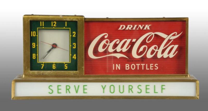 Appraisal: Coca-Cola Countertop Light-Up Sign Clock Description s Fairly good gold-plating