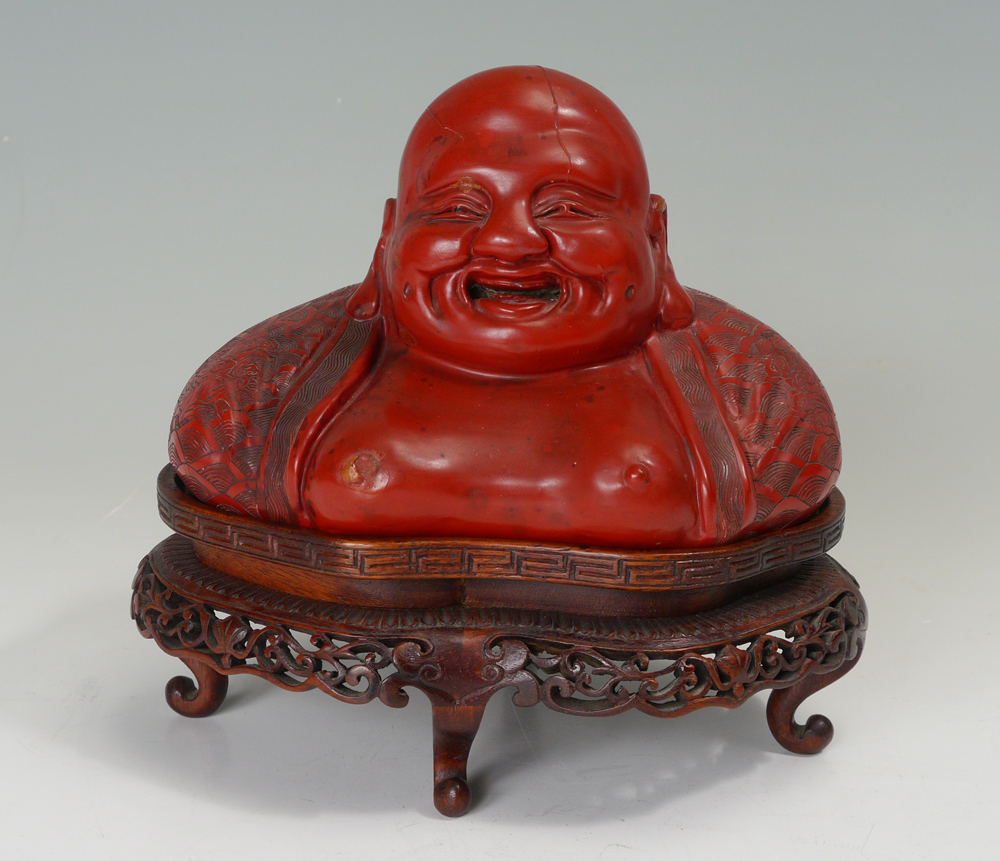 Appraisal: CARVED CHINESE CINNABAR BUST OF BUDDHA Nicely detailed bust of