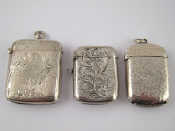 Appraisal: Three silver vesta cases Birmingham and Sheffield