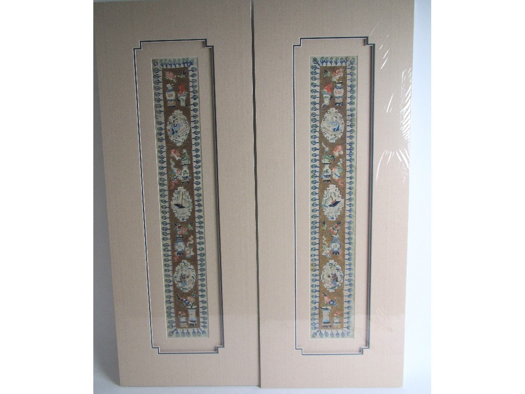 Appraisal: A pair of silk sleeve panels with medallions and precious