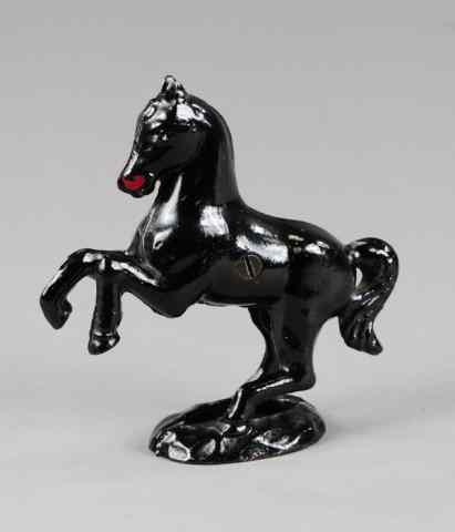 Appraisal: PRANCING HORSE ON OVAL BASE STILL BANK Hubley cast iron