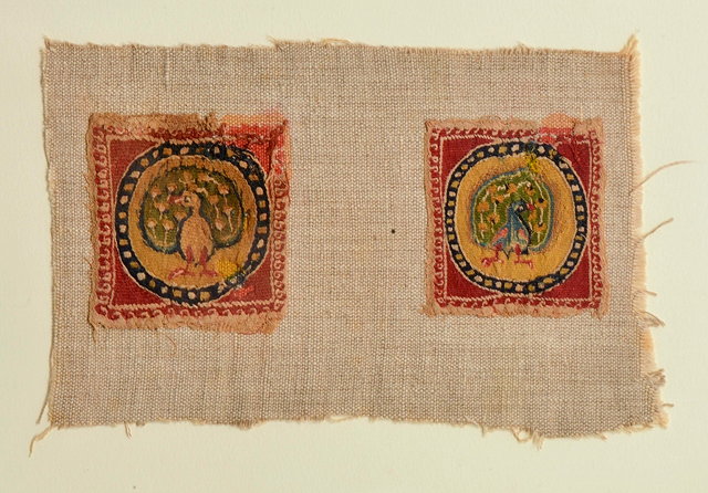 Appraisal: TWO FINE SQUARE PANELS displaying peacocks polychrome dyes within red