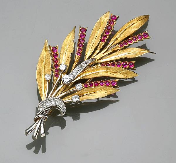 Appraisal: A diamond ruby and eighteen karat bicolor gold brooch Buccellati