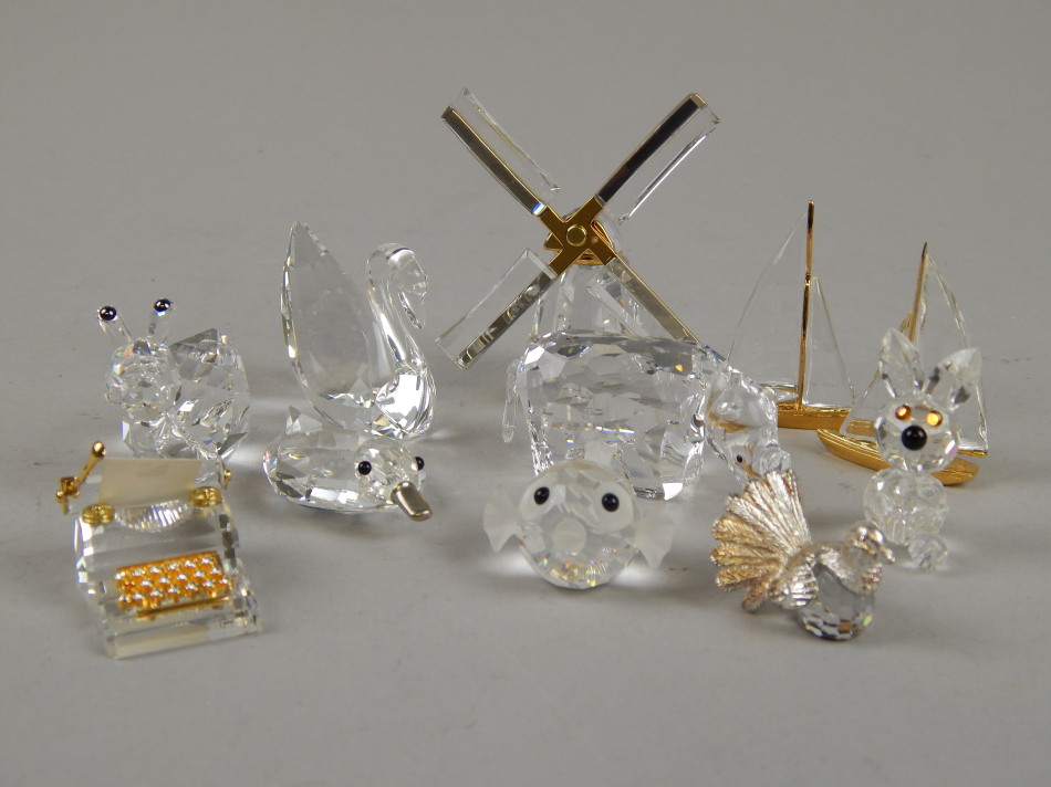 Appraisal: Various Swarovski crystal figures to include swan cm high rhinoceros