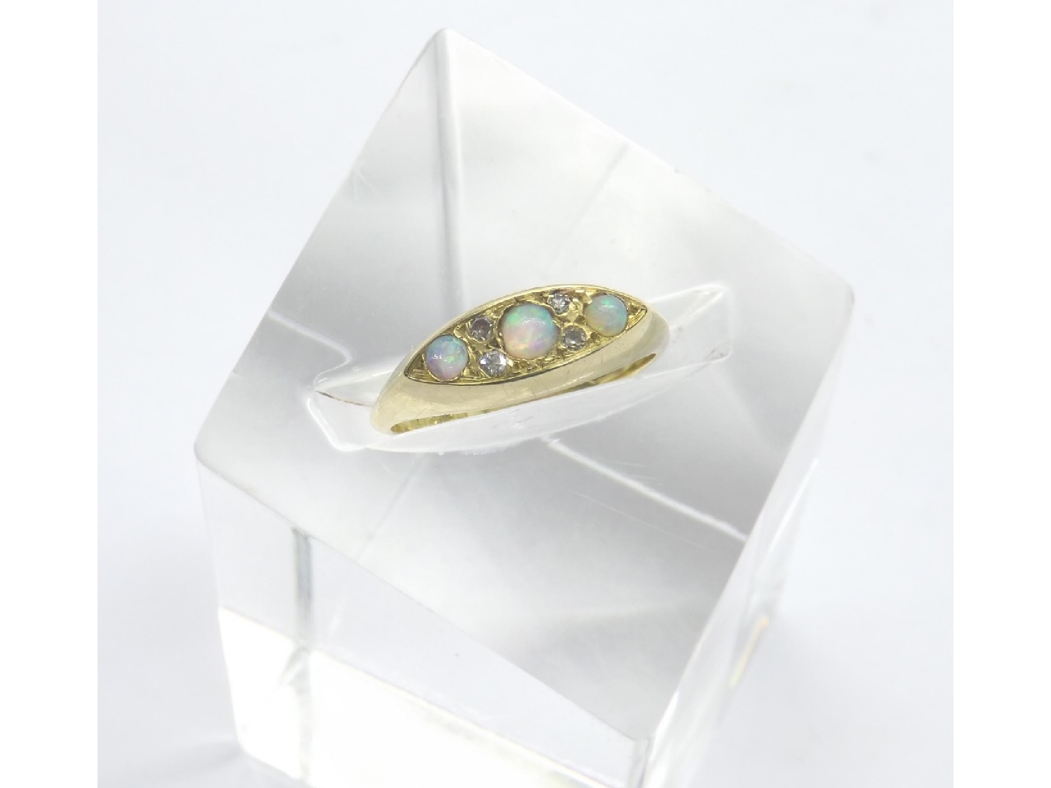 Appraisal: ct yellow gold opal and diamond boat shaped ring hallmarked