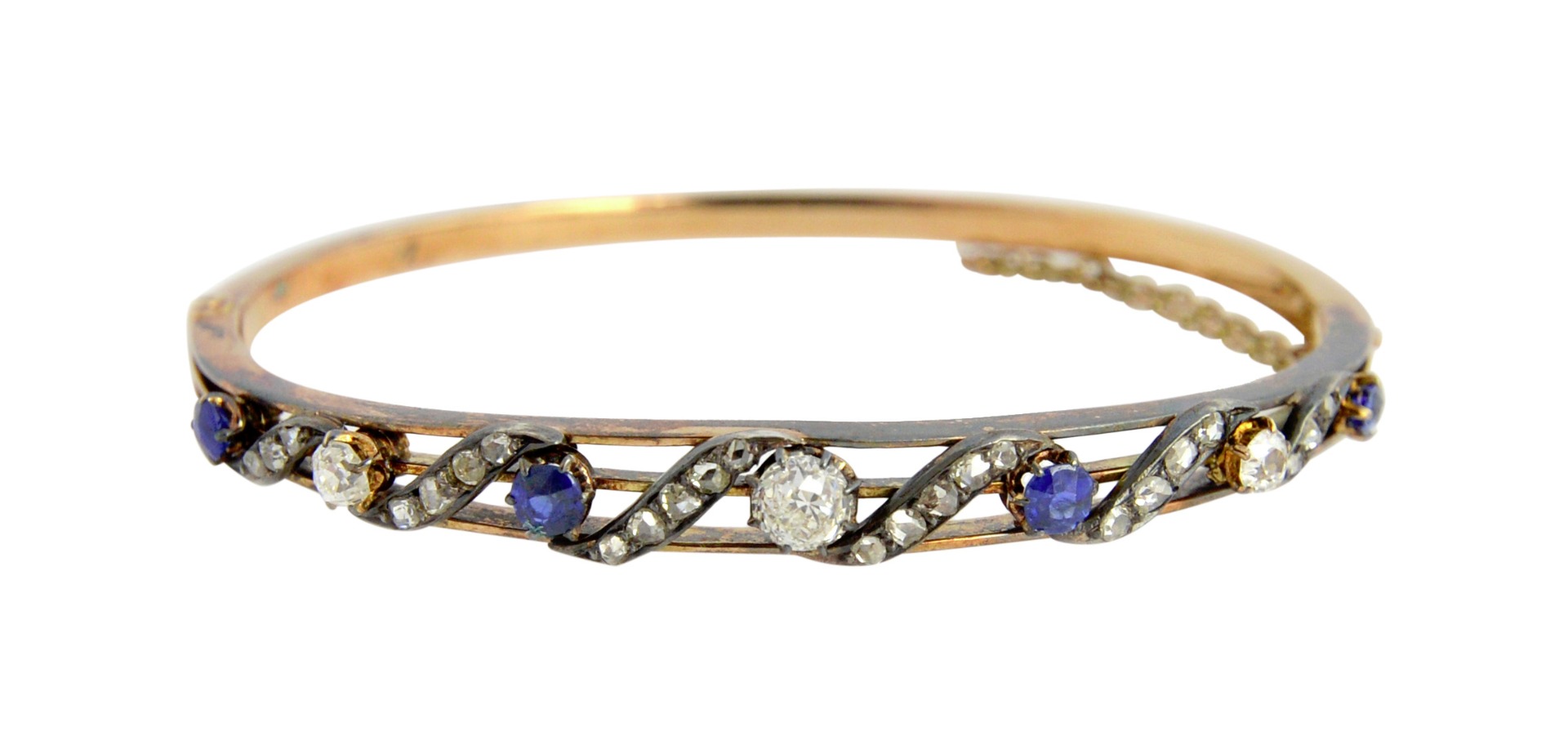 Appraisal: A Victorian gold and silver set diamond and sapphire oval