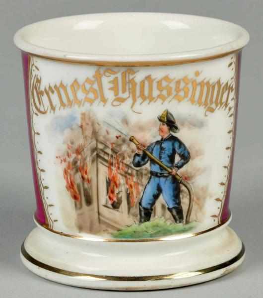 Appraisal: Fireman at Work Shaving Mug Description Gilt name Ernest Hassinger