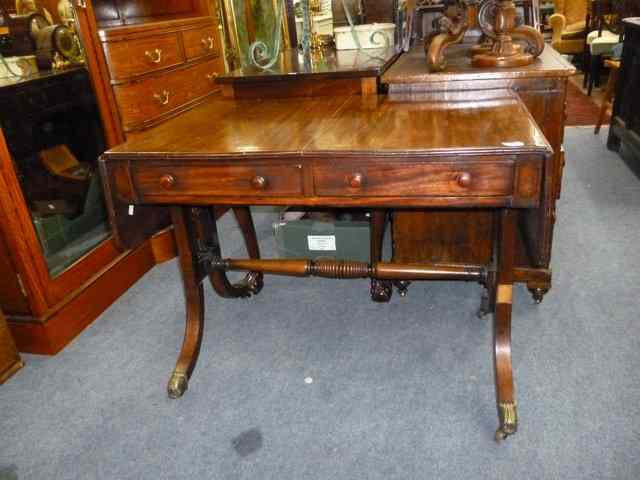 Appraisal: A TH CENTURY MAHOGANY SOFA TABLE with ebony strung decoration