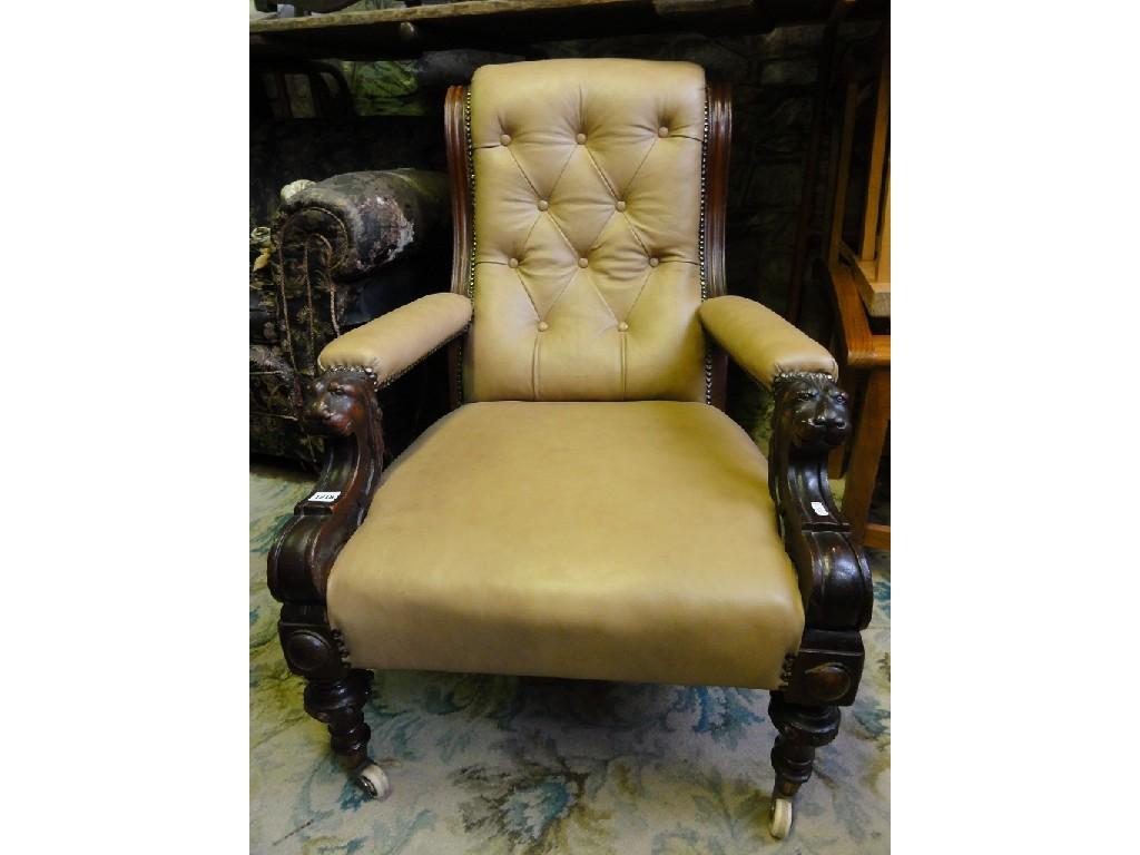 Appraisal: A Victorian mahogany open armchair with cream leather upholstered seat