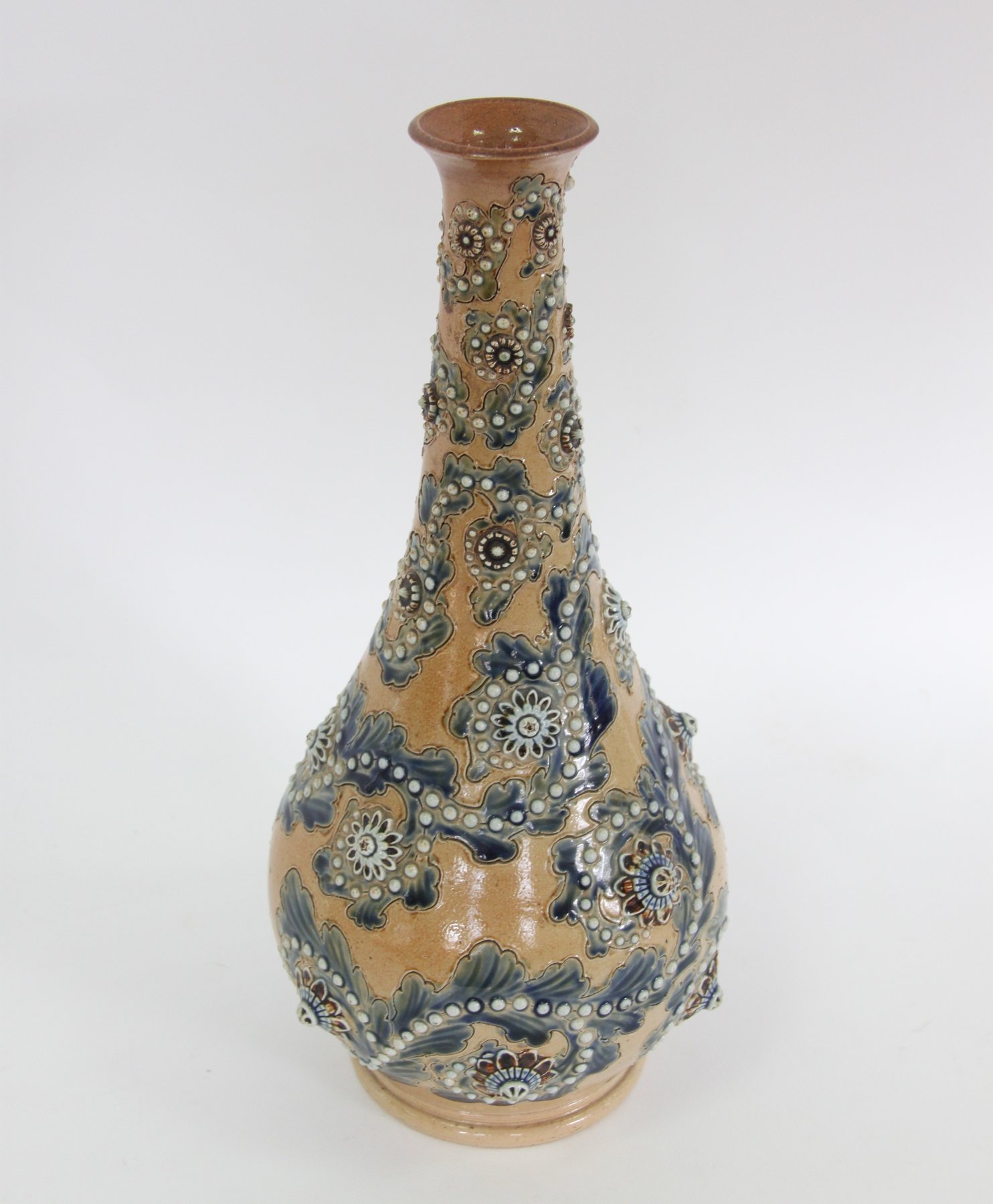 Appraisal: A Doulton Lambeth pear-shaped vase decorated trailing blue foliage with