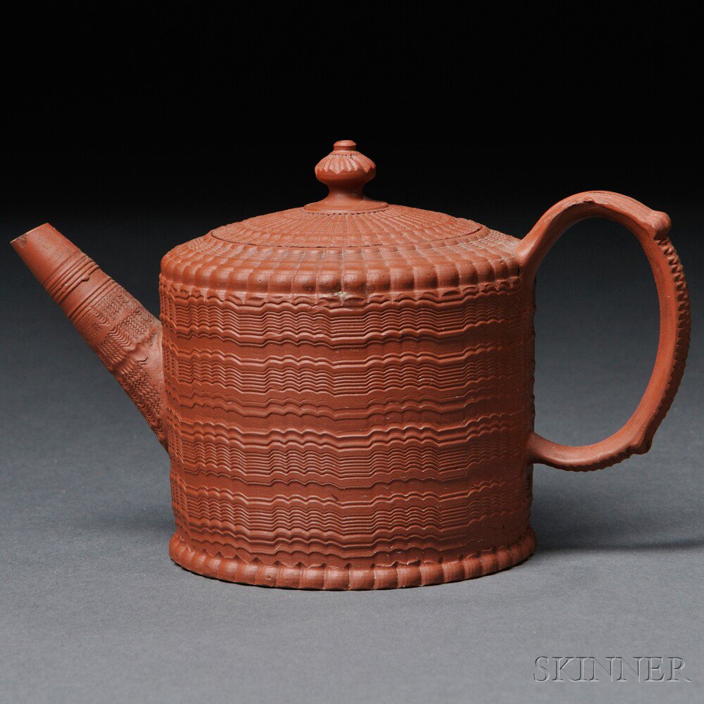 Appraisal: Staffordshire Redware Teapot and Cover England c engine-turned cylindrical shape