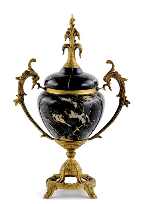 Appraisal: French ormolu-mounted marble urn circa flame finial on dome cover