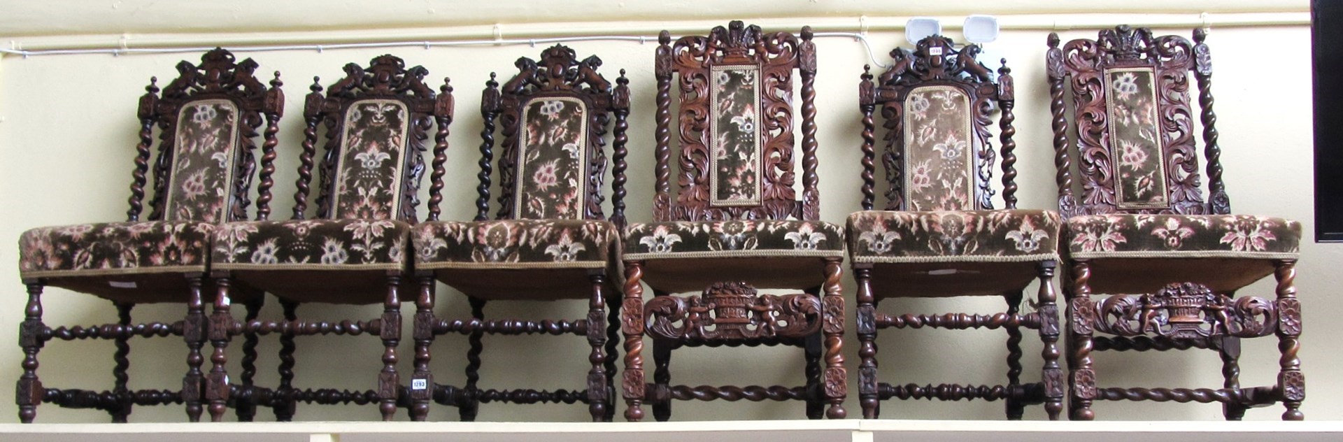 Appraisal: A set of six carved oak dining chairs of late