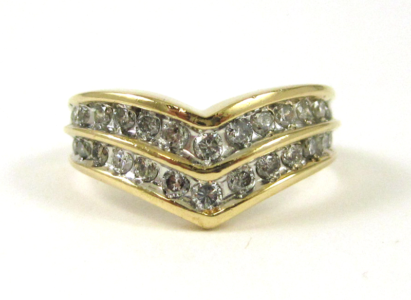 Appraisal: DIAMOND AND FOURTEEN KARAT GOLD RING with two rows of