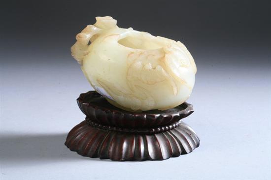 Appraisal: CHINESE CELADON JADE BRUSH WASHER Of peach-form carved with five