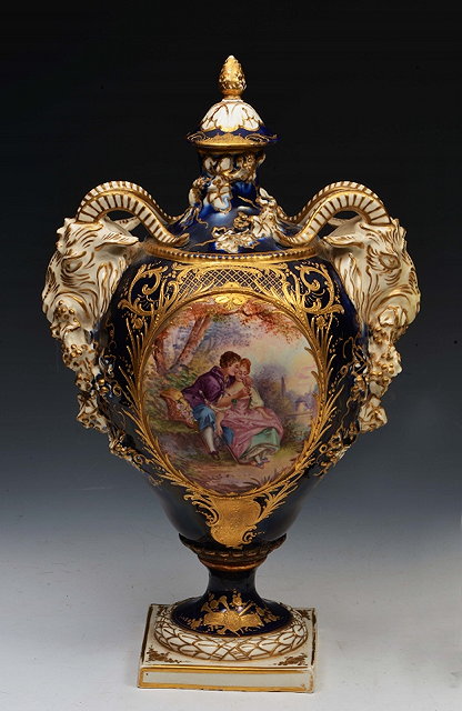 Appraisal: A TH CENTURY BLUE GROUND VASE AND COVER of urn