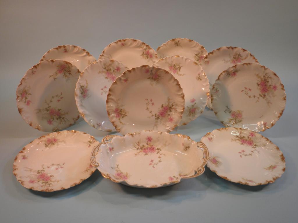 Appraisal: A Limoges part dessert service comprising an ovoid dish and