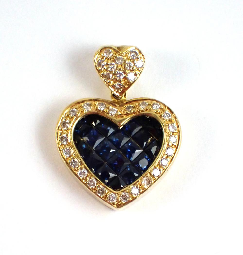 Appraisal: DIAMOND BLUE SAPPHIRE AND EIGHTEEN KARAT GOLD HEART PENDANT W