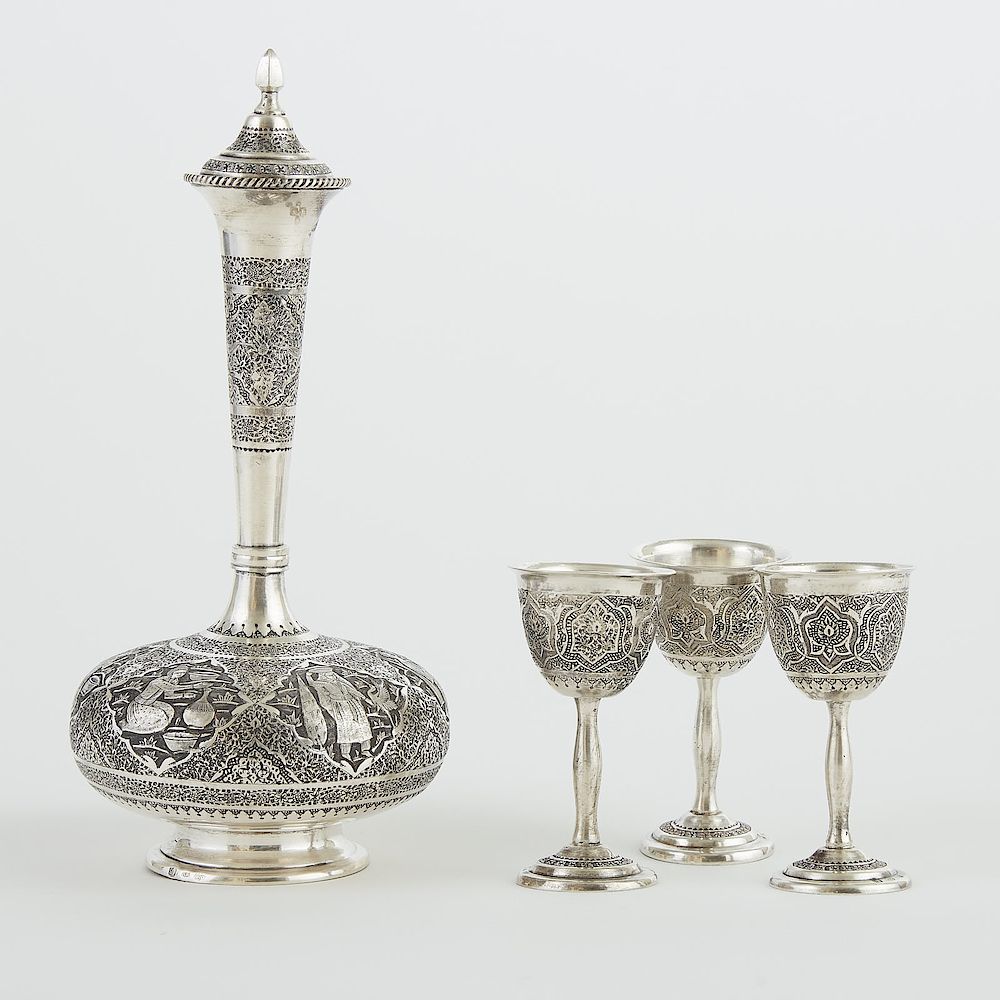 Appraisal: Persian Silver Decanter and Cups Persian Iranian engraved silver decanter