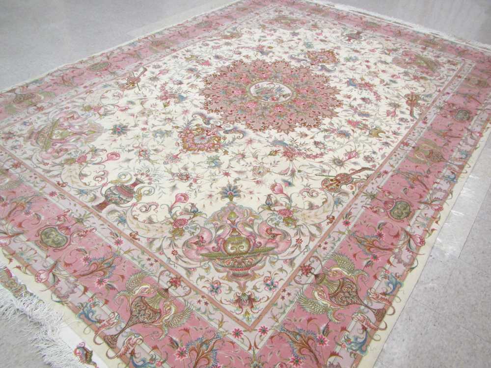 Appraisal: A CONTEMPORARY PERSIAN WOOL AND SILK CARPET hand knotted in