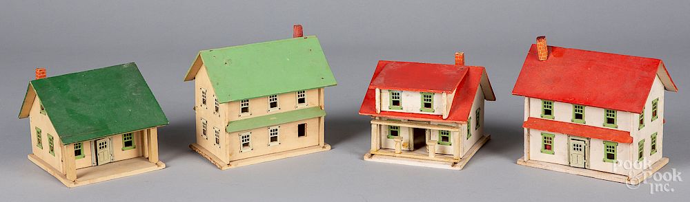 Appraisal: Four Schoenhut small painted wood train houses Four Schoenhut small