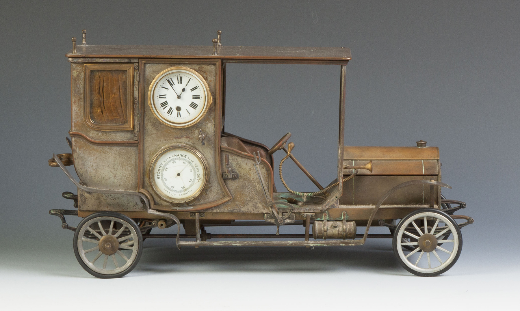 Appraisal: Rare French Automaton Car Clock by Guilmet C Brass body