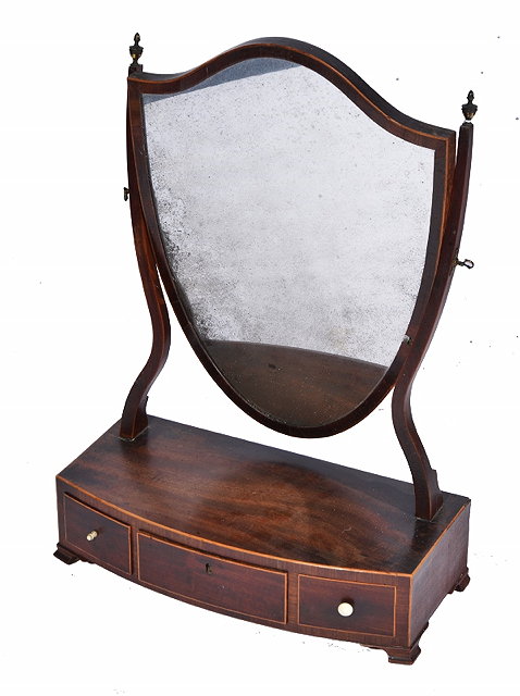 Appraisal: A GEORGE III MAHOGANY BOX TOILET MIRROR of bow fronted