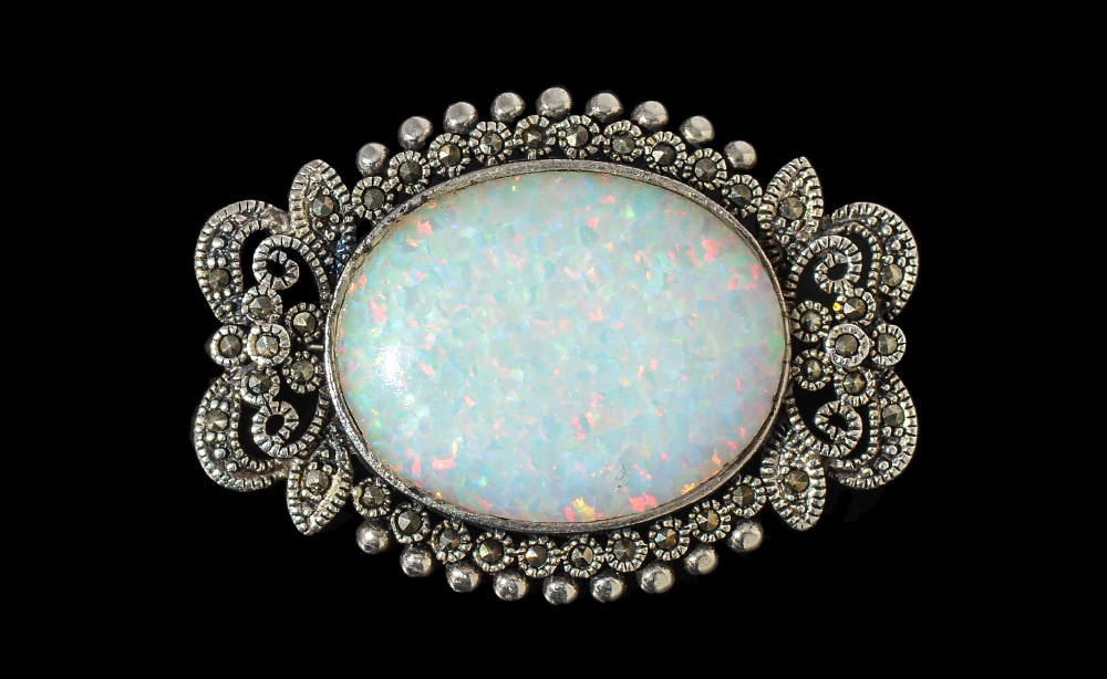 Appraisal: STERLING SILVER AND CT OPAL BROOCH Sterling silver opal brooch