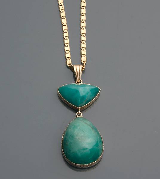 Appraisal: A cabochon gem stone and k gold pendant with k