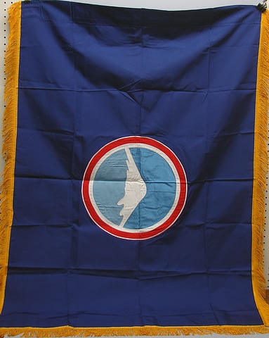 Appraisal: Blue silk flag with applied central design Flag measures x