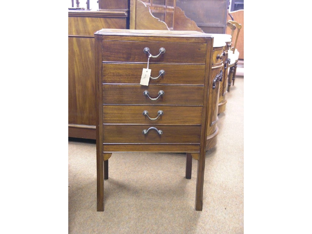 Appraisal: An early th century mahogany music chest with five fall-front