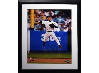 Appraisal: A photograph signed in silver marker Derek Jeter Photo File