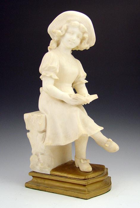 Appraisal: ALABASTER SCULPTURE GIRL READING '' h gold painted base