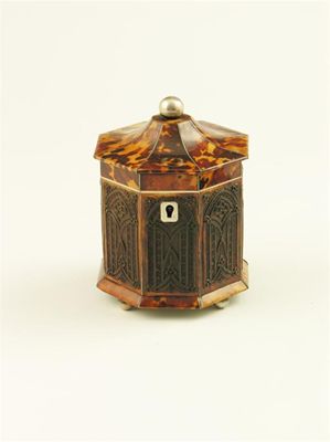 Appraisal: A George IV tortoiseshell octagonal tea caddy with silver stringing