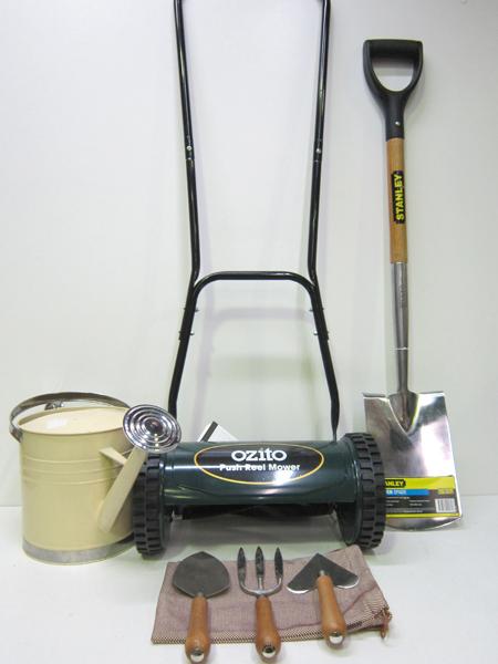 Appraisal: AN OZITO PUSH REEL MOWER WATERING CAN SPADE AND HERMES