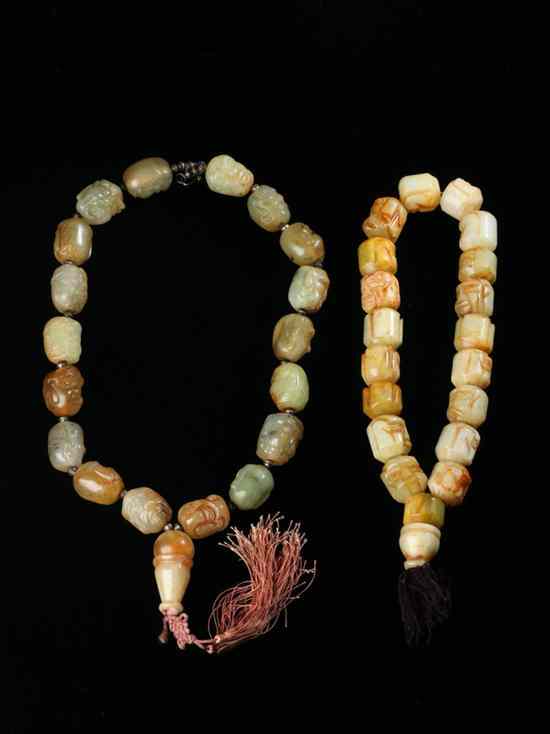 Appraisal: TWO CHINESE JADE BEADED NECKLACES Each carved with lohan heads