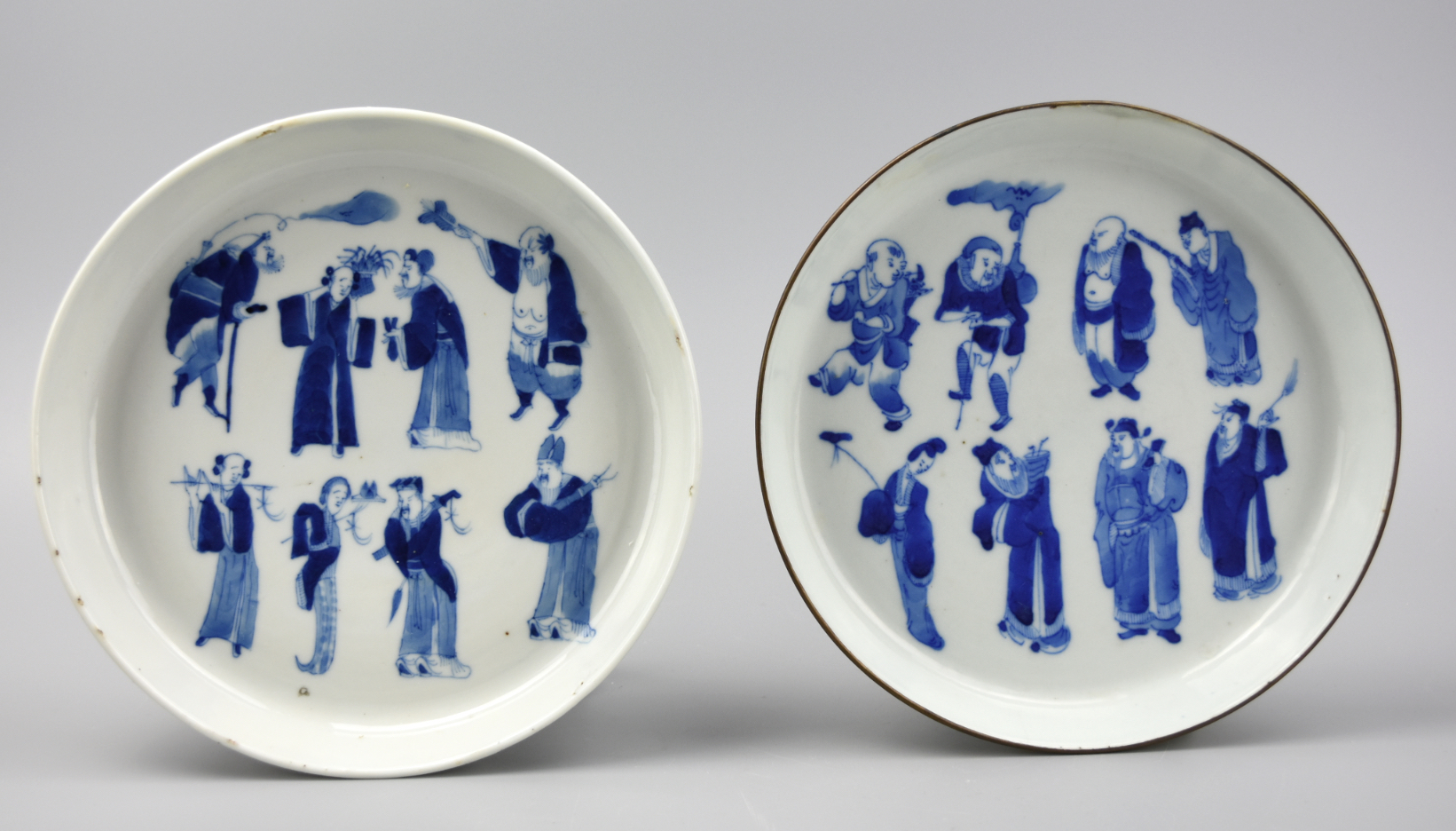 Appraisal: CHINESE BLUE WHITE PLATES W FIGURES TH C Both plates