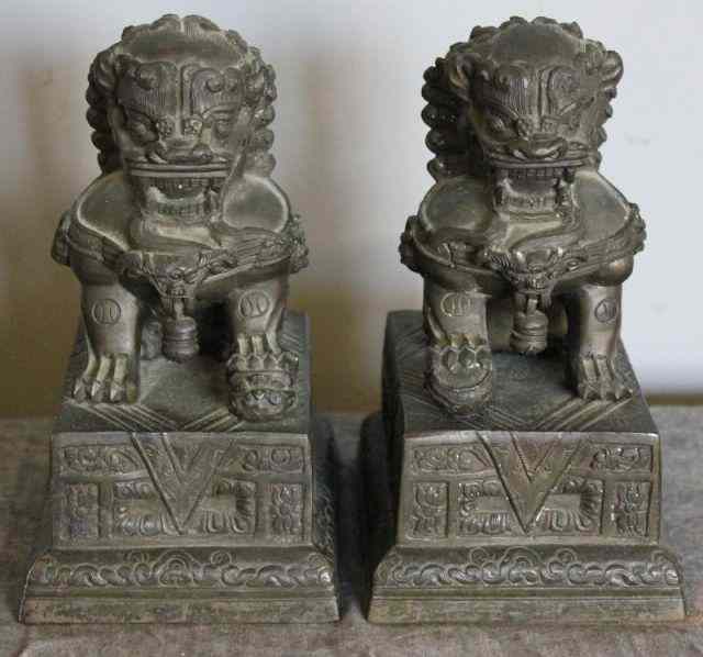 Appraisal: Pair of Chinese Bronze Foo Dogs on Plinth Bases From